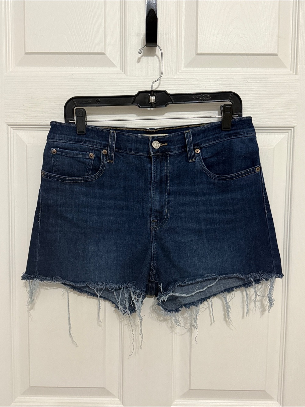 Levi’s women’s High-Rise Dark Blue Frayed Hem Denim Shorts